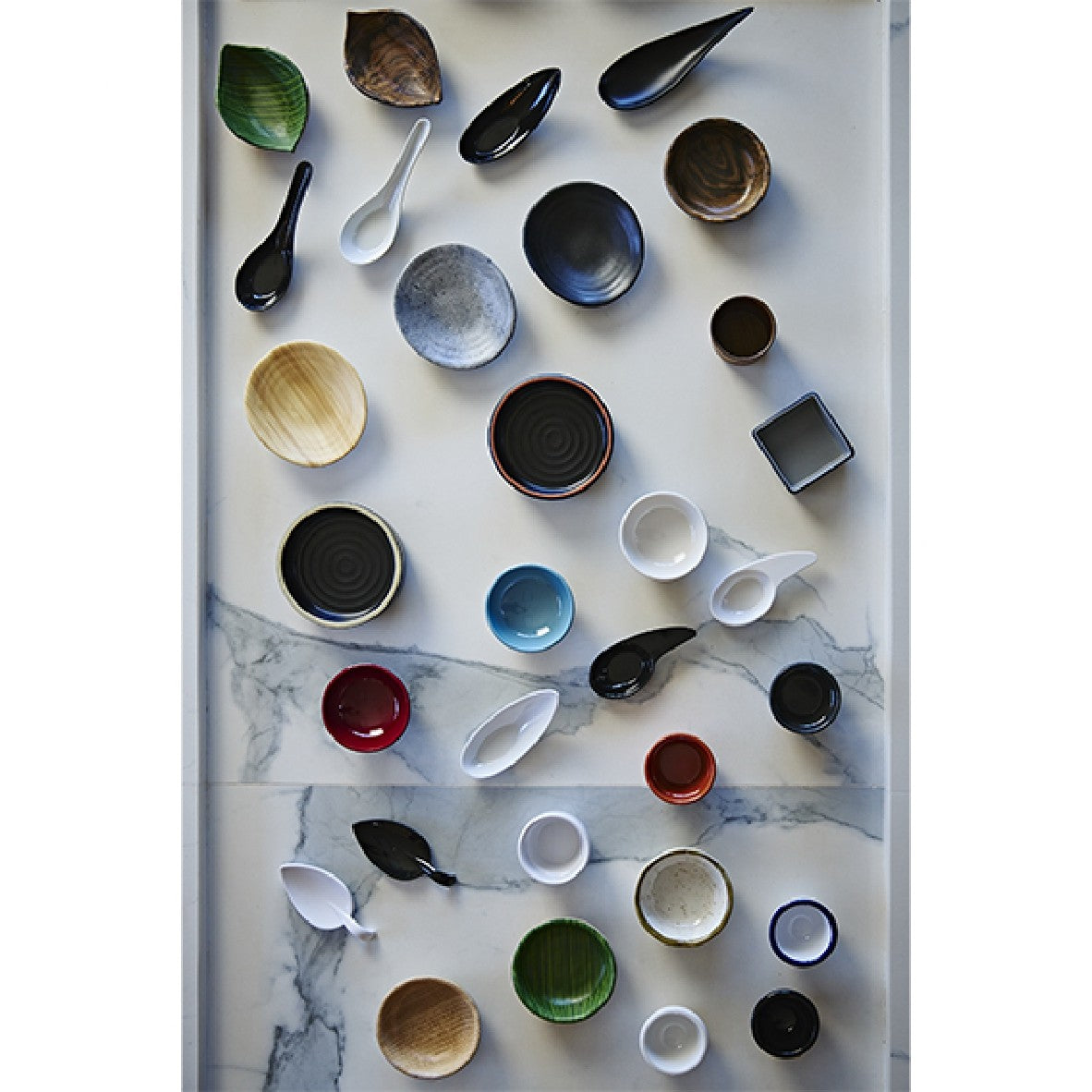 Black melamine tasting spoon. 13 x 4.5 cm (60 units)